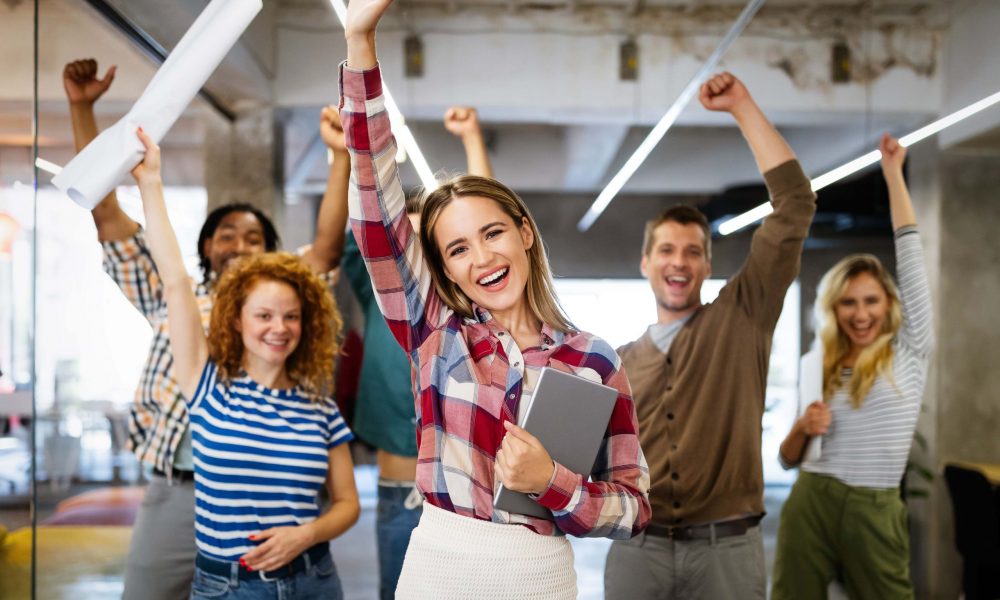 Successful company with happy employees colleagues in modern office